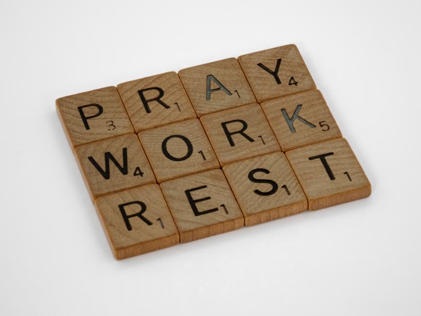 Reflecting quietly while using a digital faith app to rebuild prayer habits and spiritual motivation
